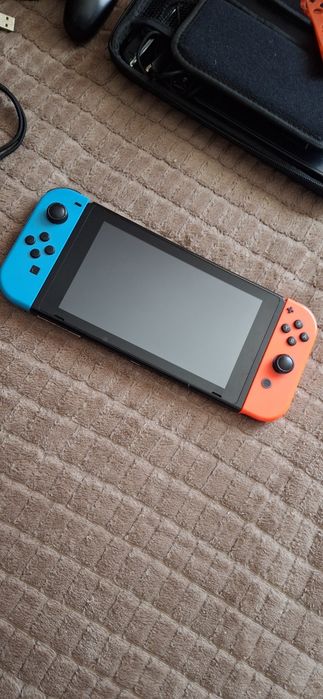 Vand Nintendo switch impecabil
