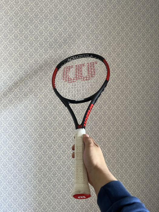 Теннисная ракетка