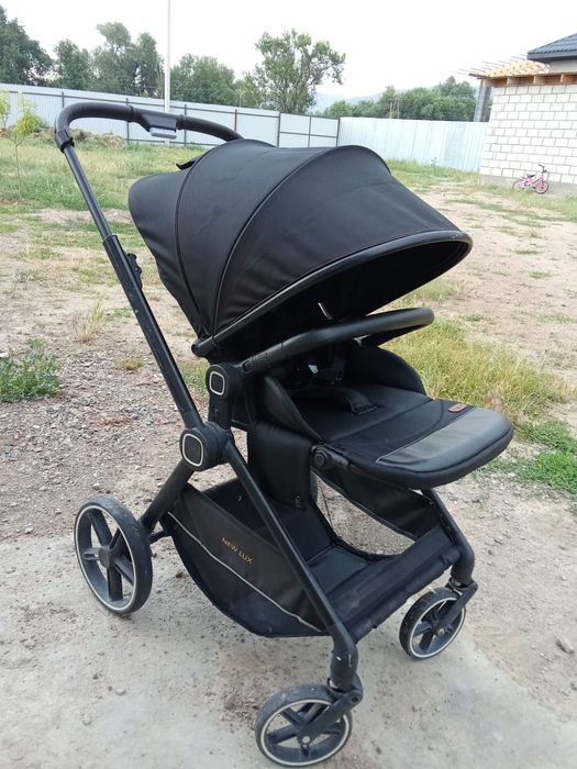 Коляска от фирмы NEW LUX