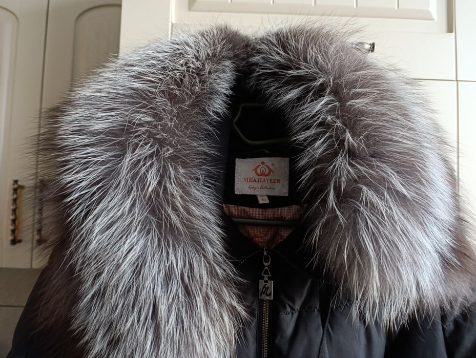 Зимний женский пуховик