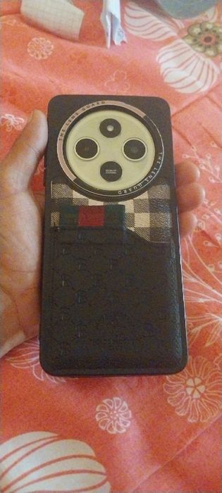 Redmi 14C xotira 256/6 xolati alo pubgda yaxwi