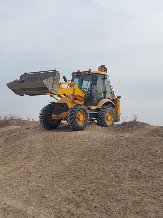 Экскаватор погрузчик услуги