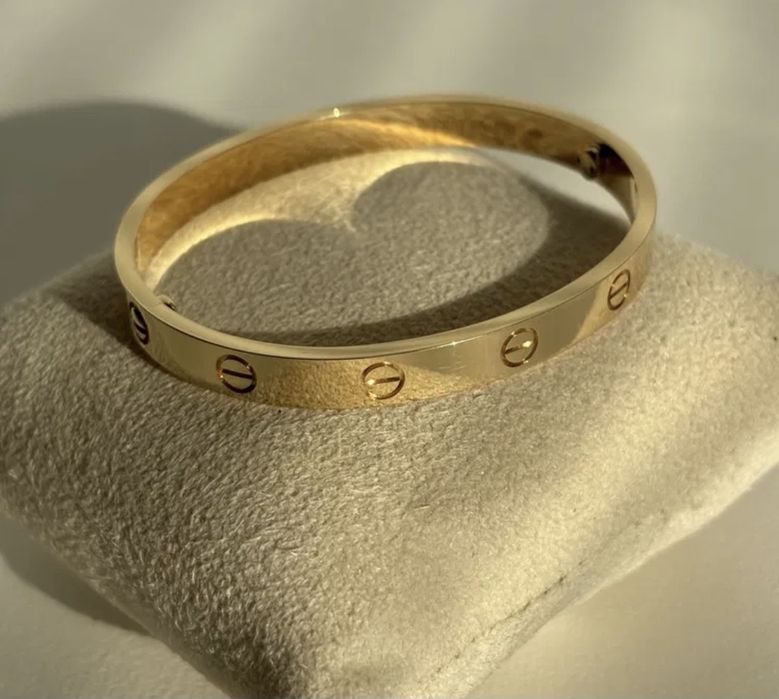 Bratara aur 14k dama Cartier