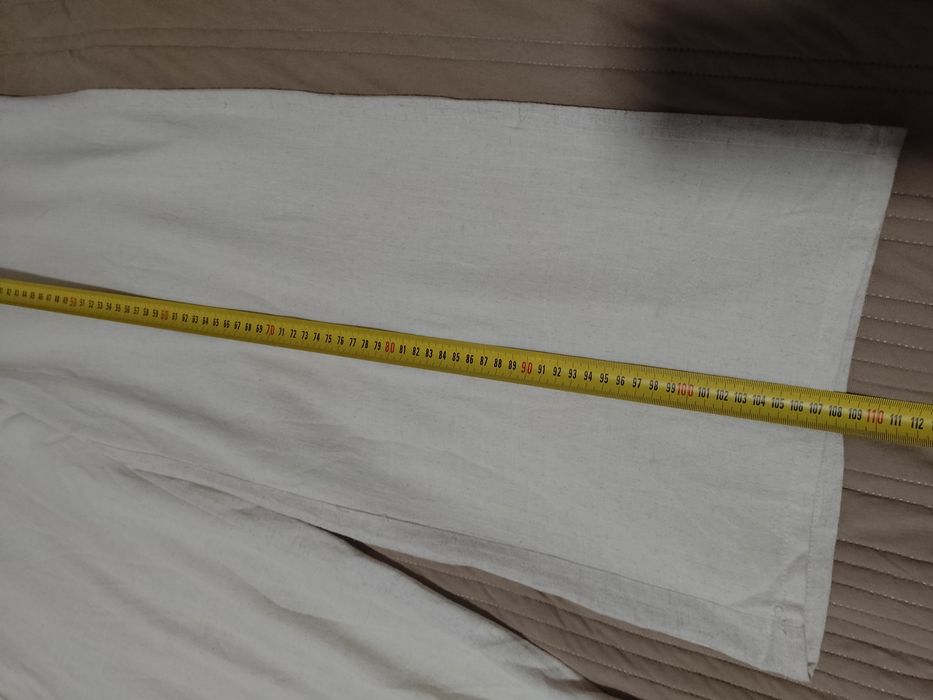 Pantaloni cu talie înaltă și crac larg