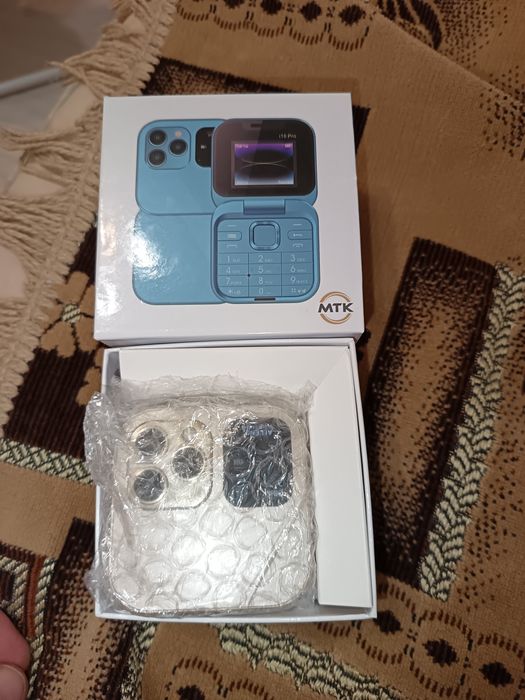 Кнопочный телефон