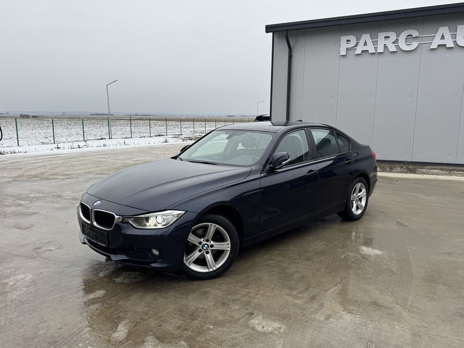 Bmw Faruri bi xenon/navigatie/senzori fata spate/jante/rate/garantie