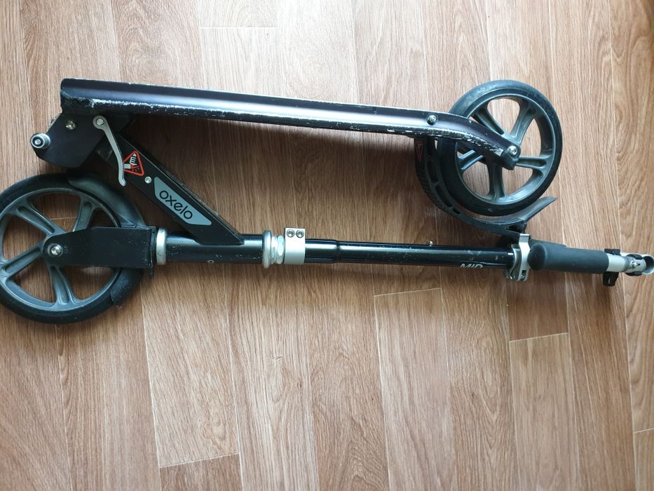 Продам самокат б/у фирменный Oxelo mid 7.