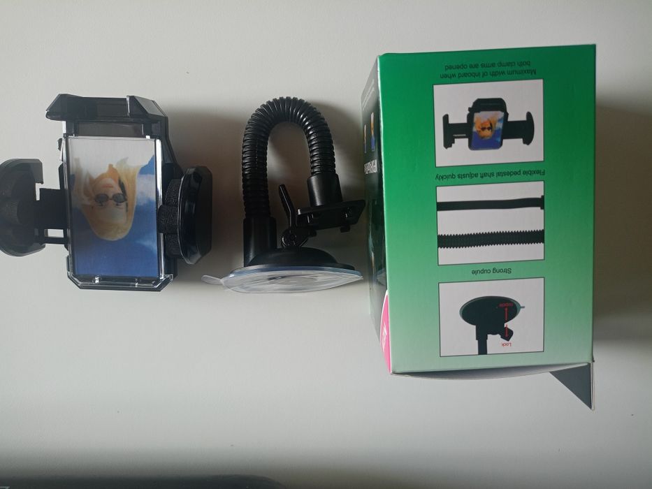 Vând suport auto pentru telefon,gps,reglabil, produs de calitate superioara nou la cutie.
