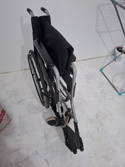 Инвалидная коляска