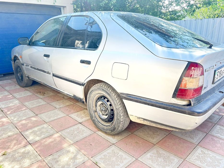 Машина Ниссан Примера