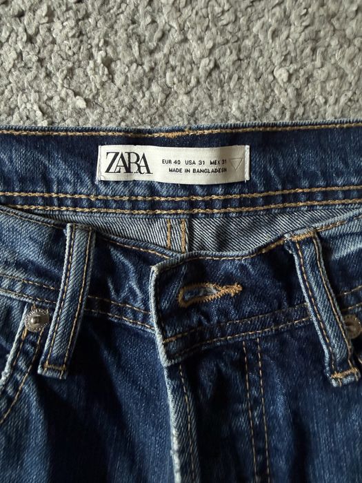 новые рваные джинсы Zara