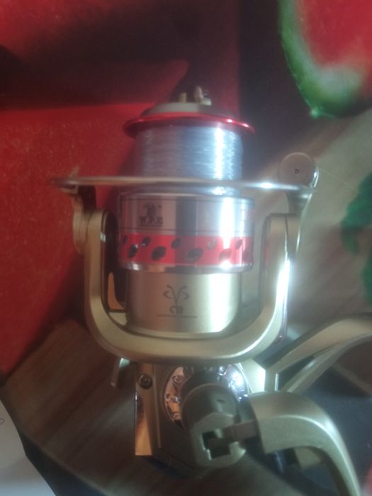 Катушка со спинингом