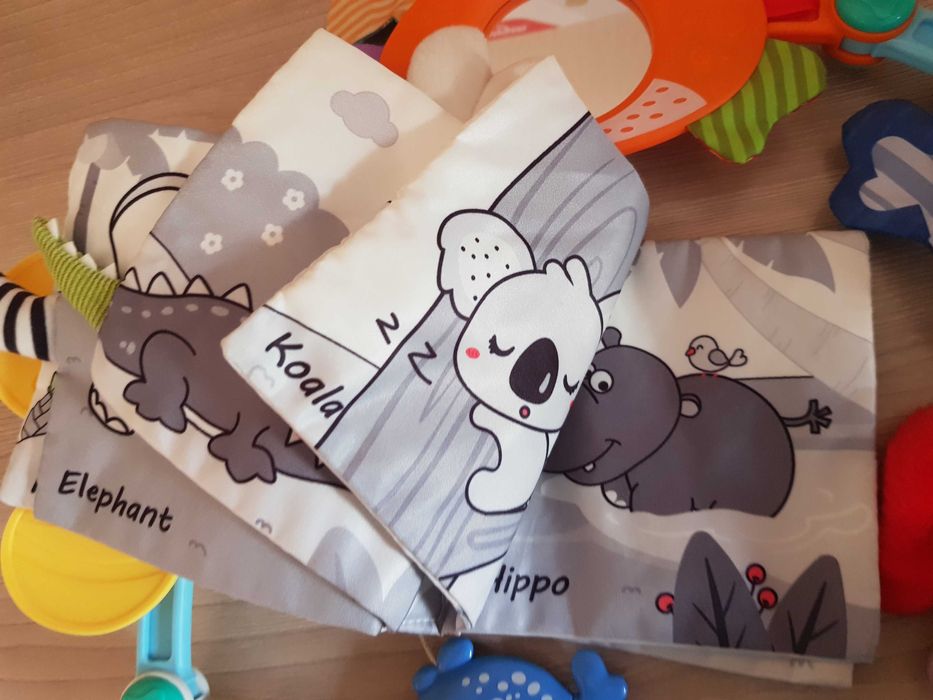 Игрушка дуга Huanger на коляску