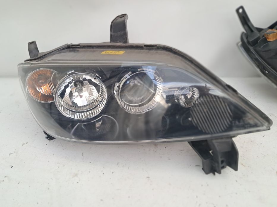 Фар Mazda 3  2003г
