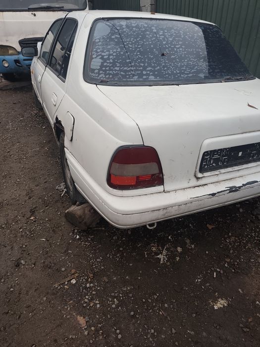 Продам нисан сани по запчастям