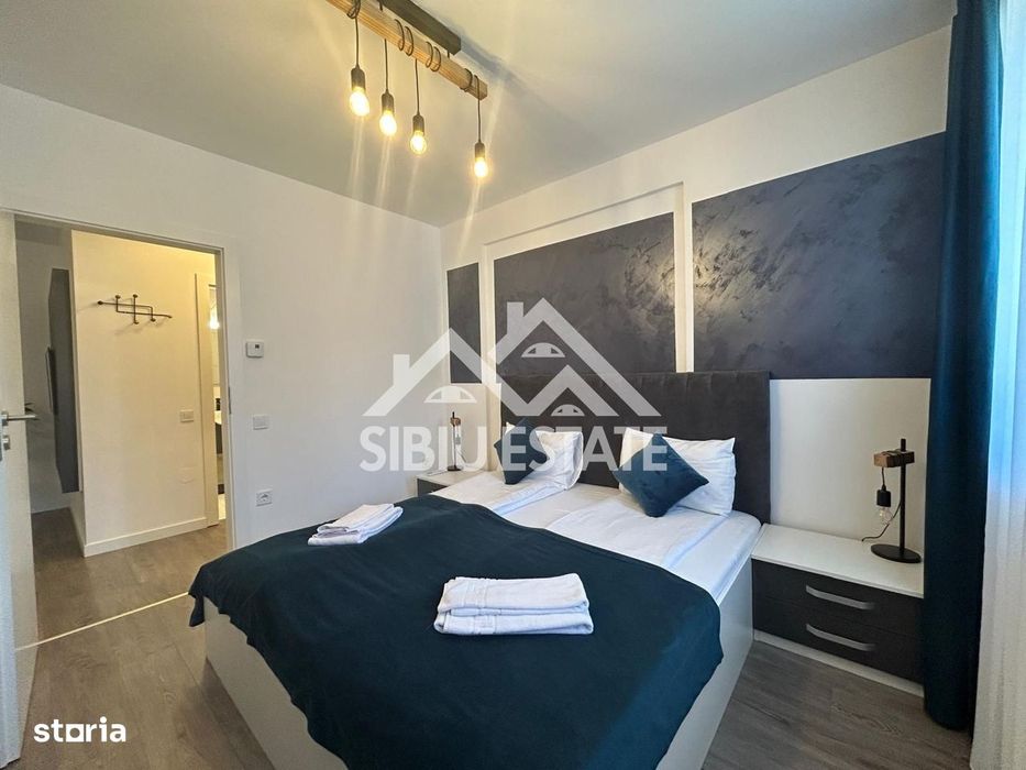 Apartament mobilat-utilat, cu 2 camere, balcon, parcare si boxa