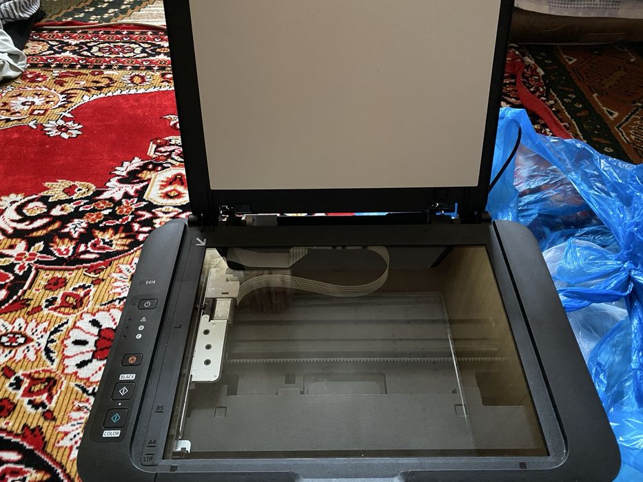 Canon E414 …………..