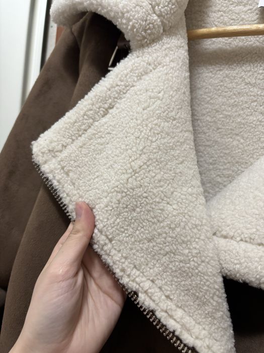 Теплая дубленка.