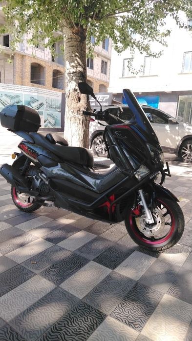 Moto skuter ikki oyoqlik