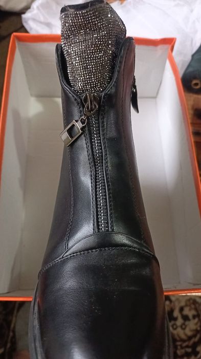 Продам новые сапоги