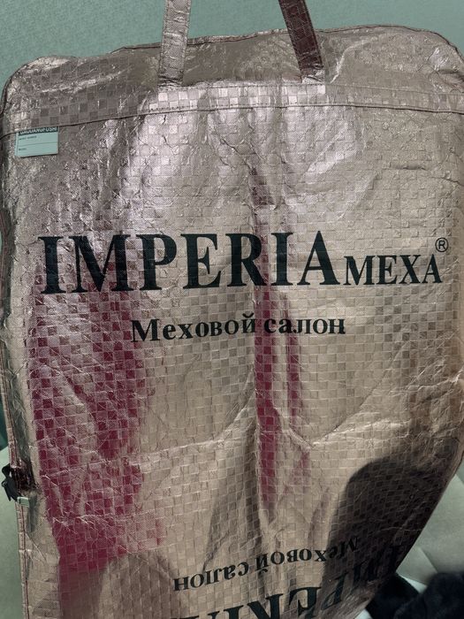 Шуба в идеальном состоянии.