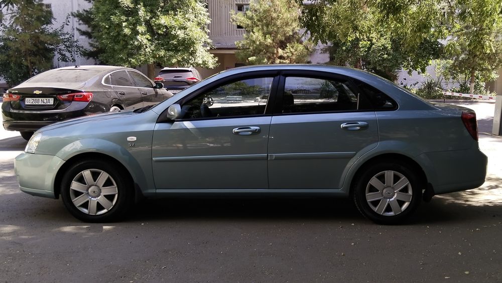 Lasseti 1.6 пробег 273 000 км. (бирюзовый) механика 2005 год !