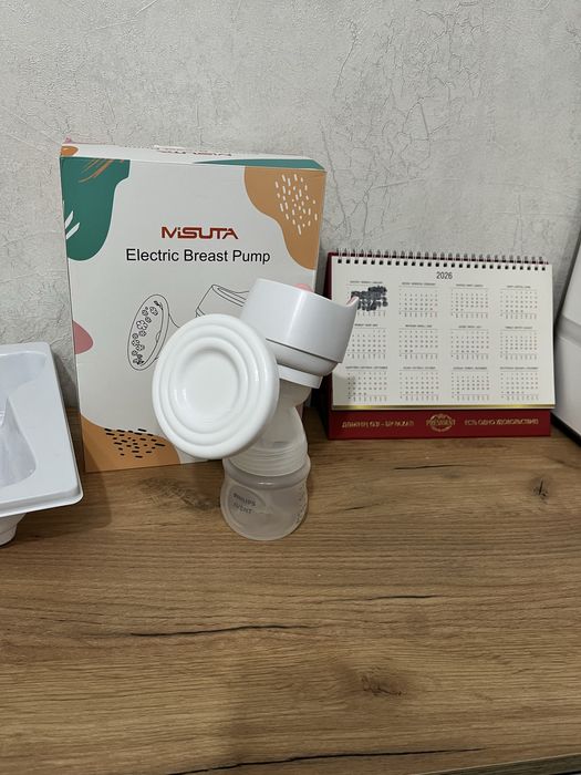 Продам молокоотсос электрический