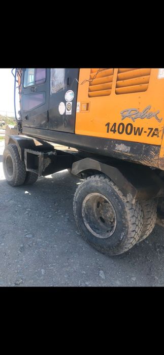 Экскаватор на ходу