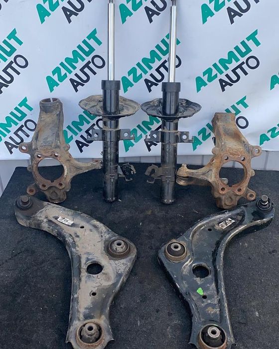 Амортизатор стойка цапфа поворотный кулак рычаг nissan qashqai x-trail