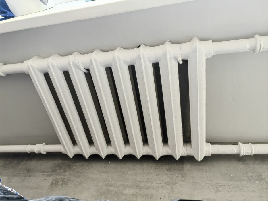 Продам б/у чугунные батареи