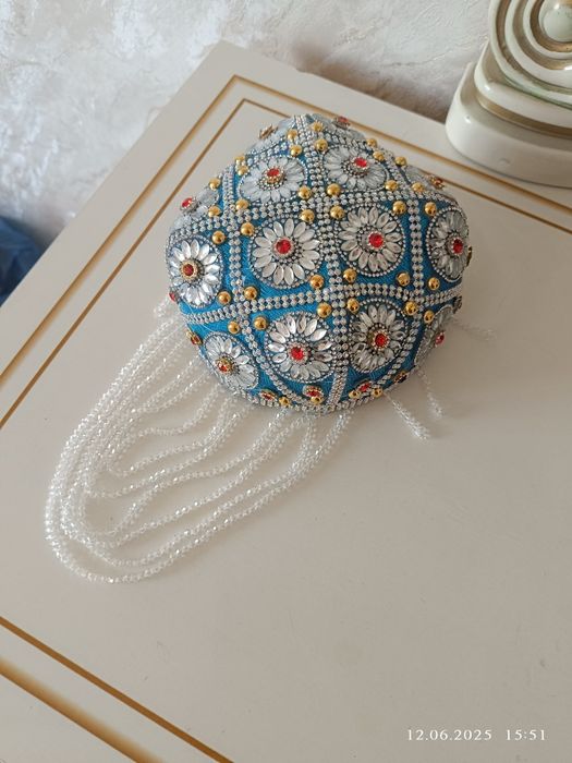 Уйғур допписи сетилиду 5000