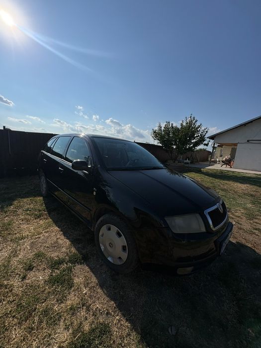 Vând sau sxhimb scoda fabia  cu acte valabila