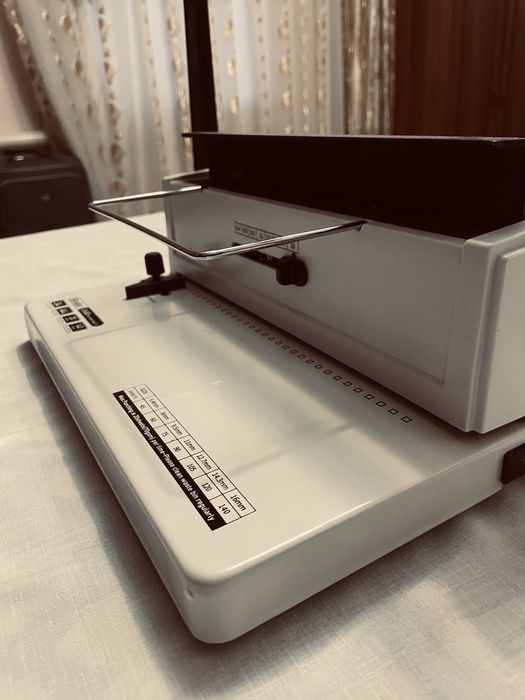 Переплетная машина на металлическую пружину