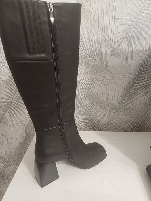 Продам новые сапоги