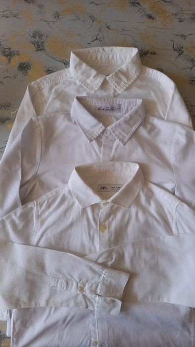 Продам  рубашки,костюм.