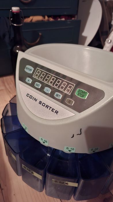 Монетоброячна машина - машина за броене на левове и стотинки