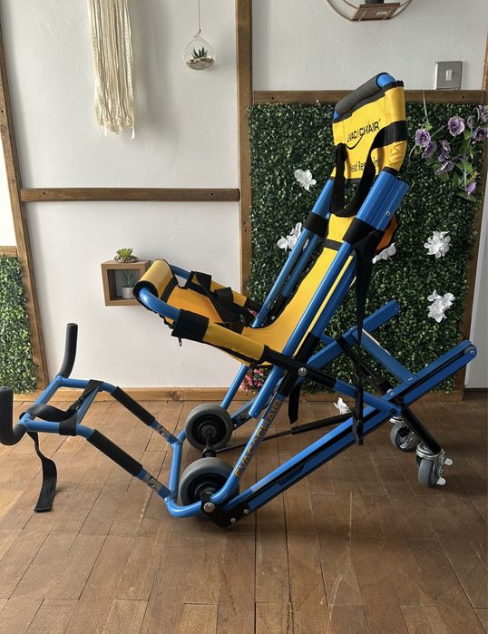 Scaun (targa ) cu rotile  pentru urcare si coborare scari