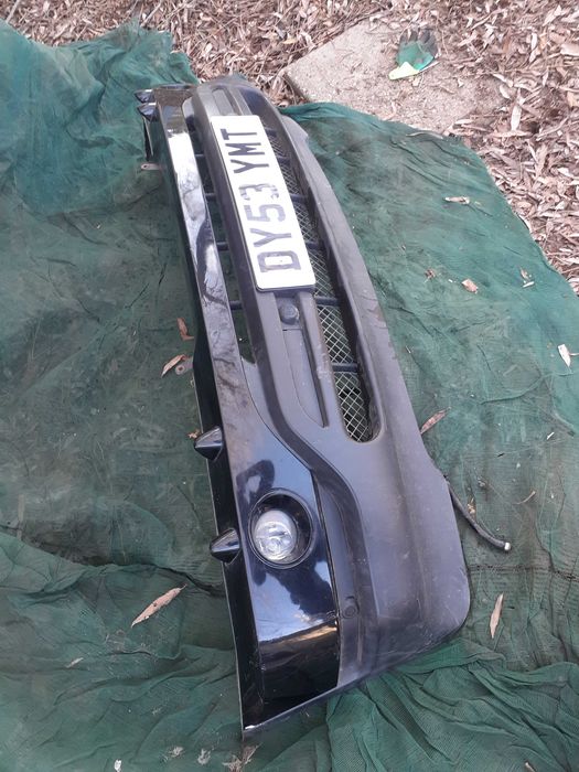 Bara fata Spoiler masca  Bmw X5 E53 culoare neagra stare f buna.