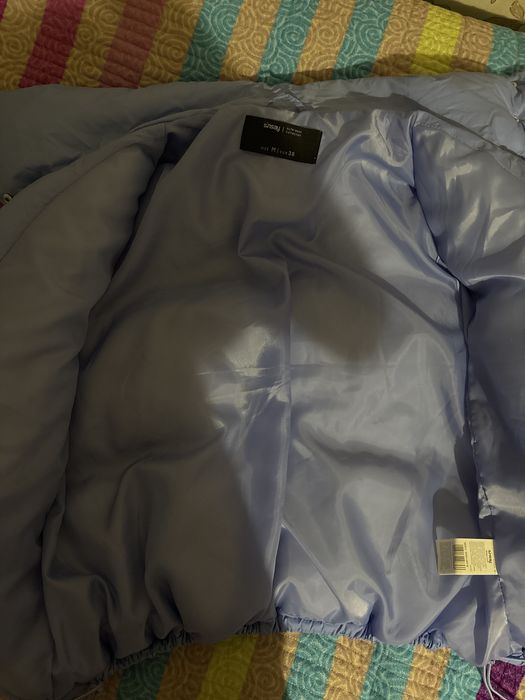 Продаи куртку голубую