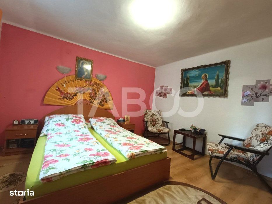 Casa cu 4 camere si curte 400 mp cu acces auto de vanzare in Selimbar
