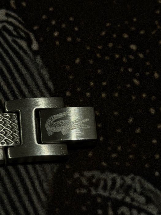 Гривна lacoste.