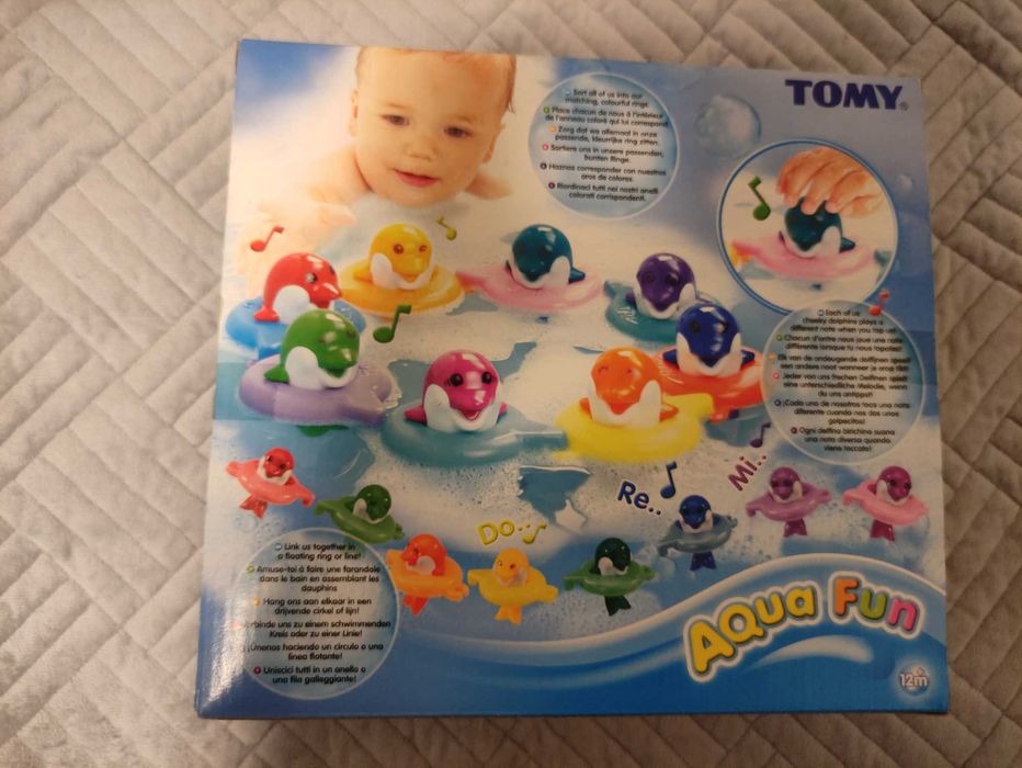 Игрушка для ванной (поющие дельфины)