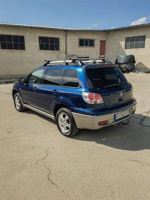 Mitsubishi outlander 2.0 136к.с Газ-бензин