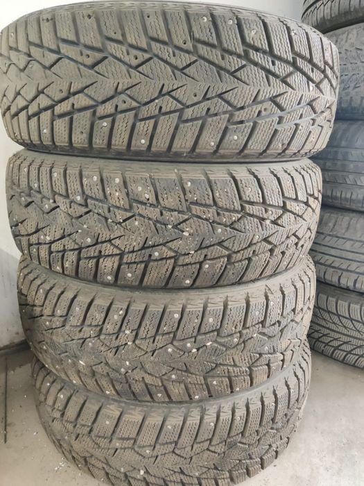 Продам шипованные шины