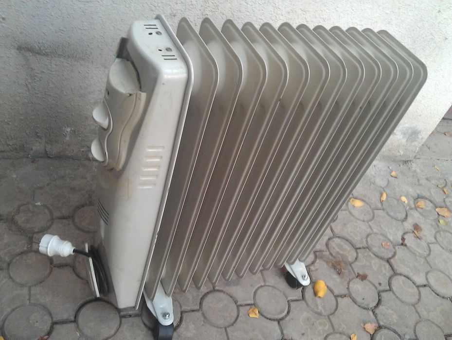 Масляный обогреватель новый