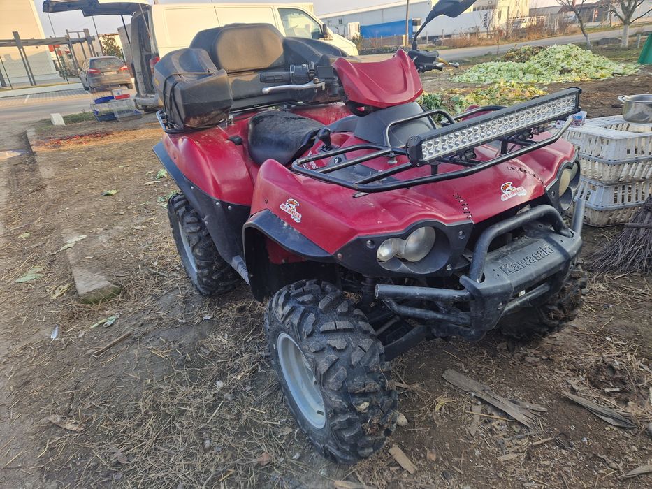 Vând sau schimb ATV Kawasaki