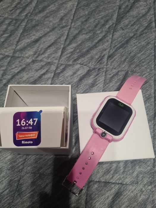 Продам  детские часы телефон