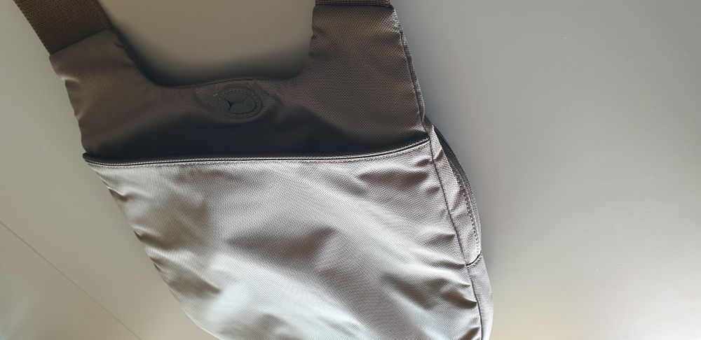 Tumi, borseta lux ,unisex, condiție impecabilă