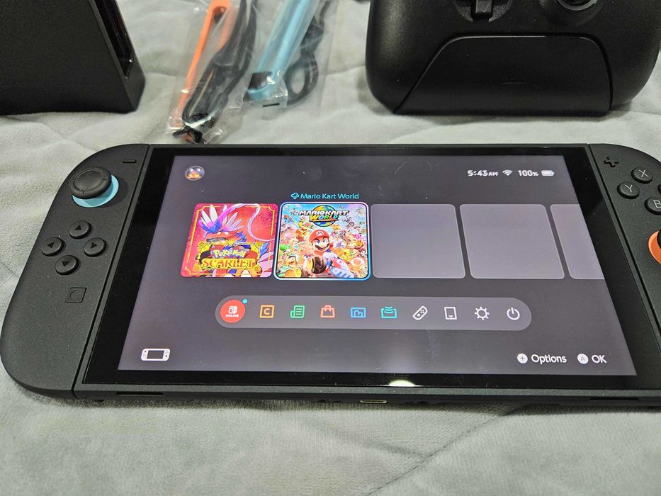 Nintendo Switch 2 комплект (4 игри, контролер, калъф Nacon, силиконов кейс)