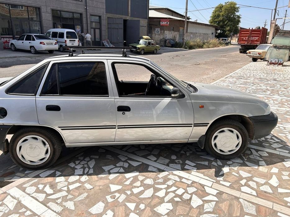 Neksiya 1.  2003 yil bez Rasxod donis .moshina naxadu